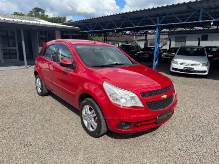 CHEVROLET - AGILE - 2010/2011 - Vermelha - R$ 34.900,00