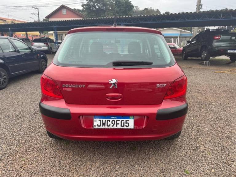 PEUGEOT - 307 - 2009/2010 - Vermelha - R$ 25.900,00